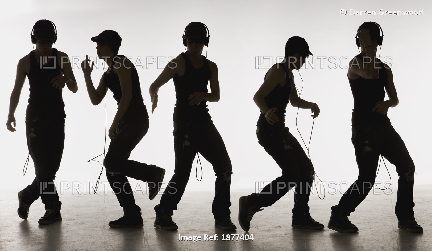 Composite Image Of A Boy Dancing With Headphones; Edmonton, Alberta, Canada