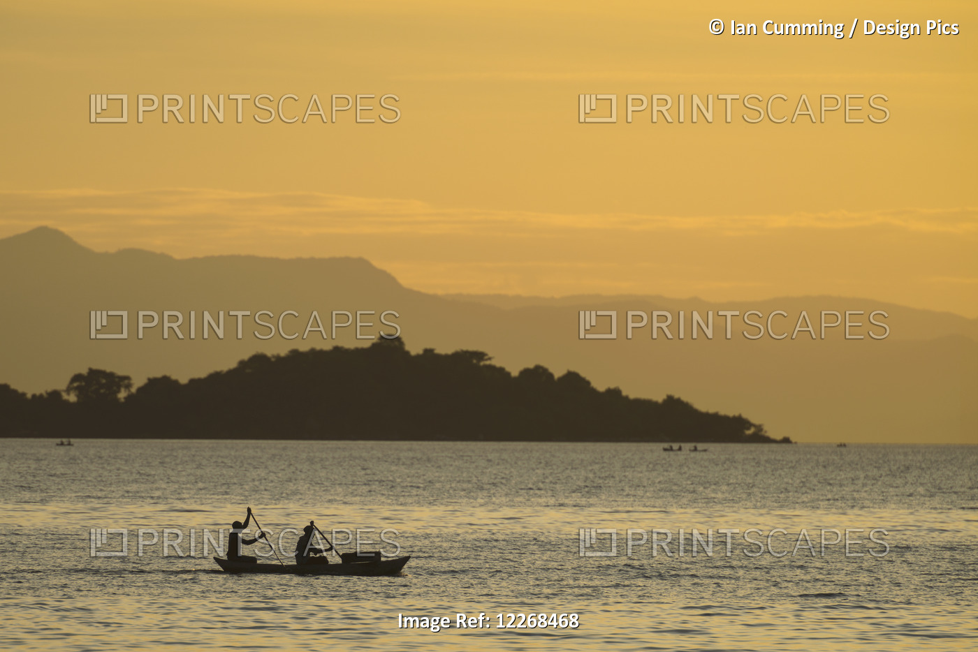 Silhouette Of Fishermen In Dugout Canoe Leaving Cape Maclear In The Evening, ...