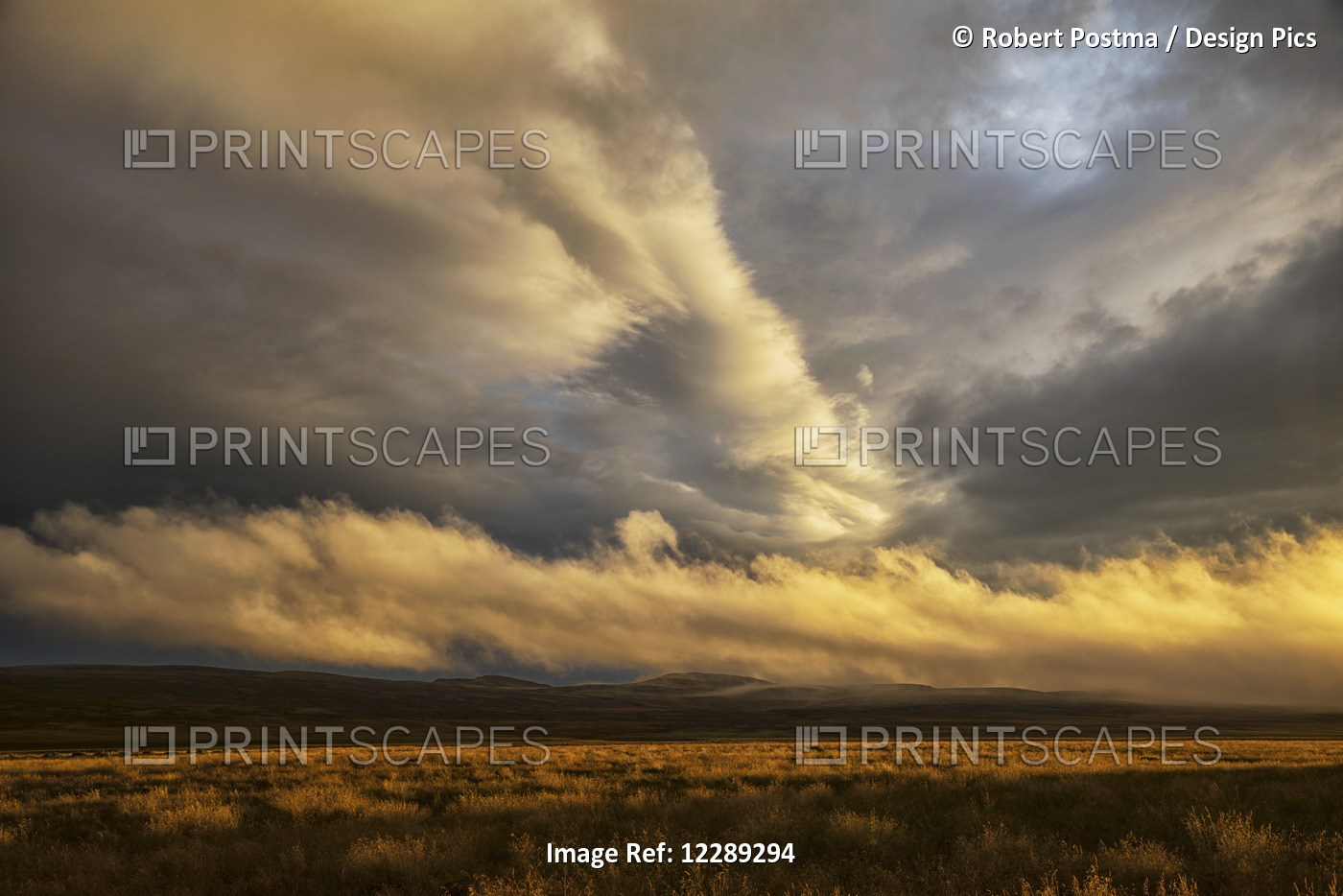 Storm Clouds Illuminated Over The Northeastern Region Of Iceland; Iceland