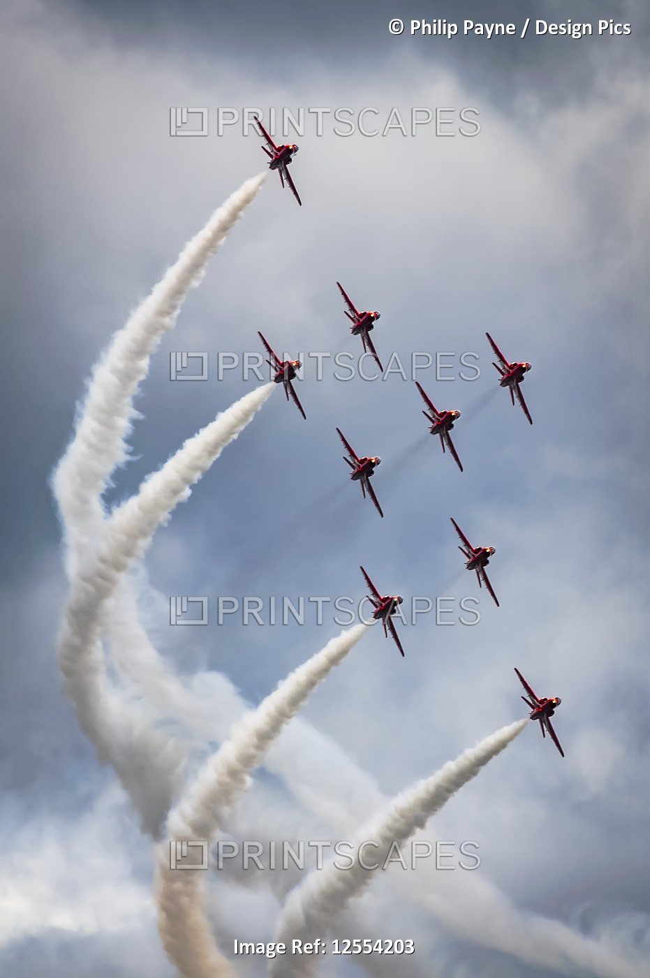 Red Arrows air display, nine planes flying in diamond nine formation, their ...